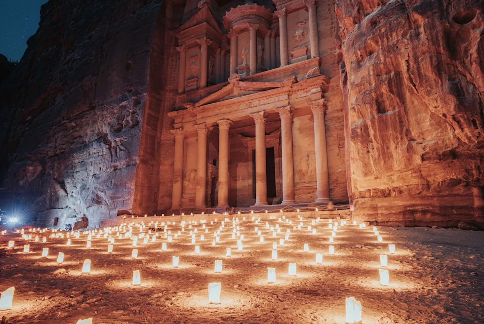 Candles light up the night sky in Petra, Jordan