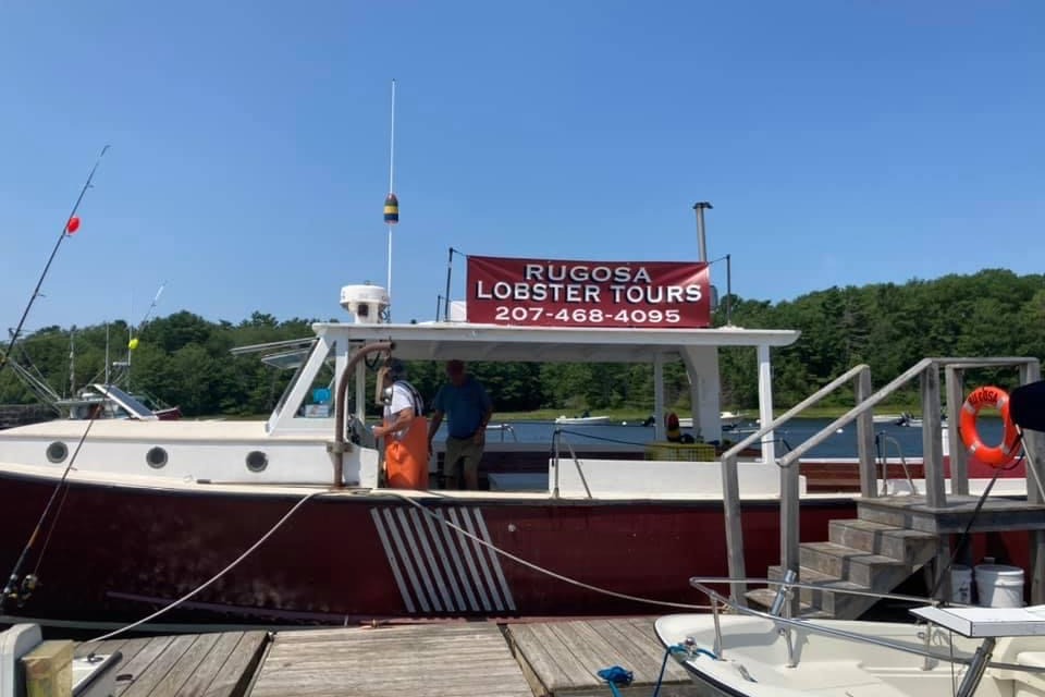 A boat at the dock in daytime