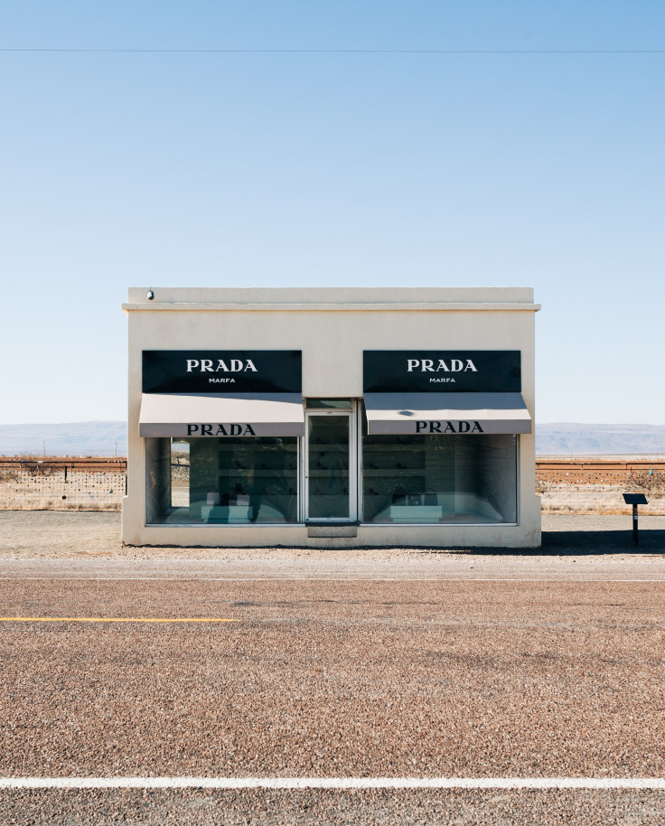 An art installation of a black and white abandoned Prada store on a side of a highway in west Texas.