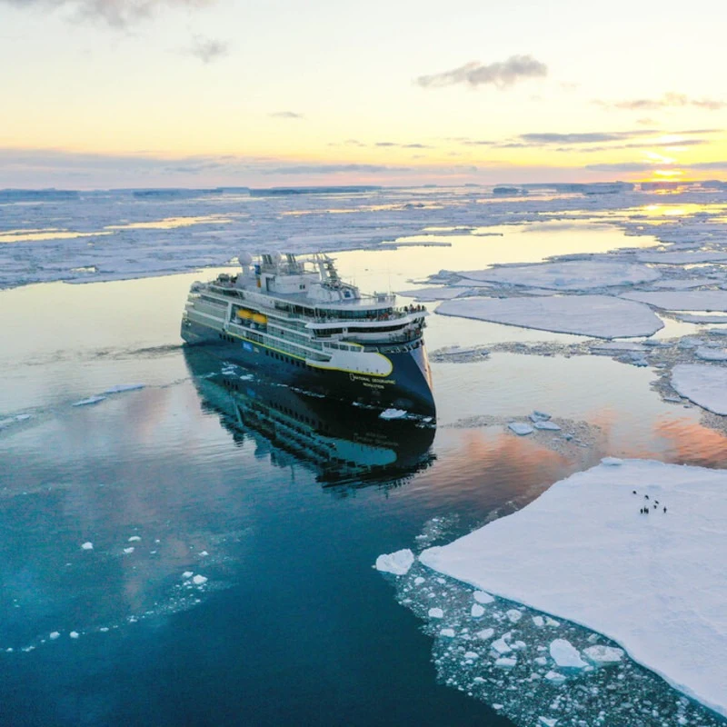aerial view of a ship on an ice-covered ocean