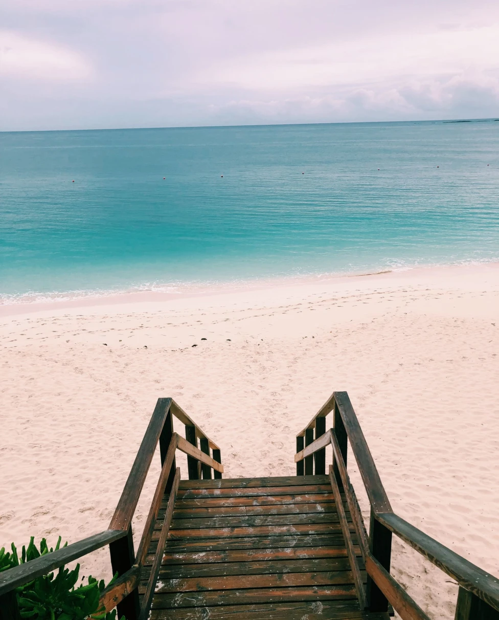 wood stairs down to the beach