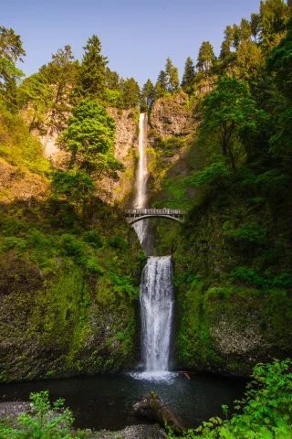 green landscape with waterfall and bridge columbia river gorge oregon