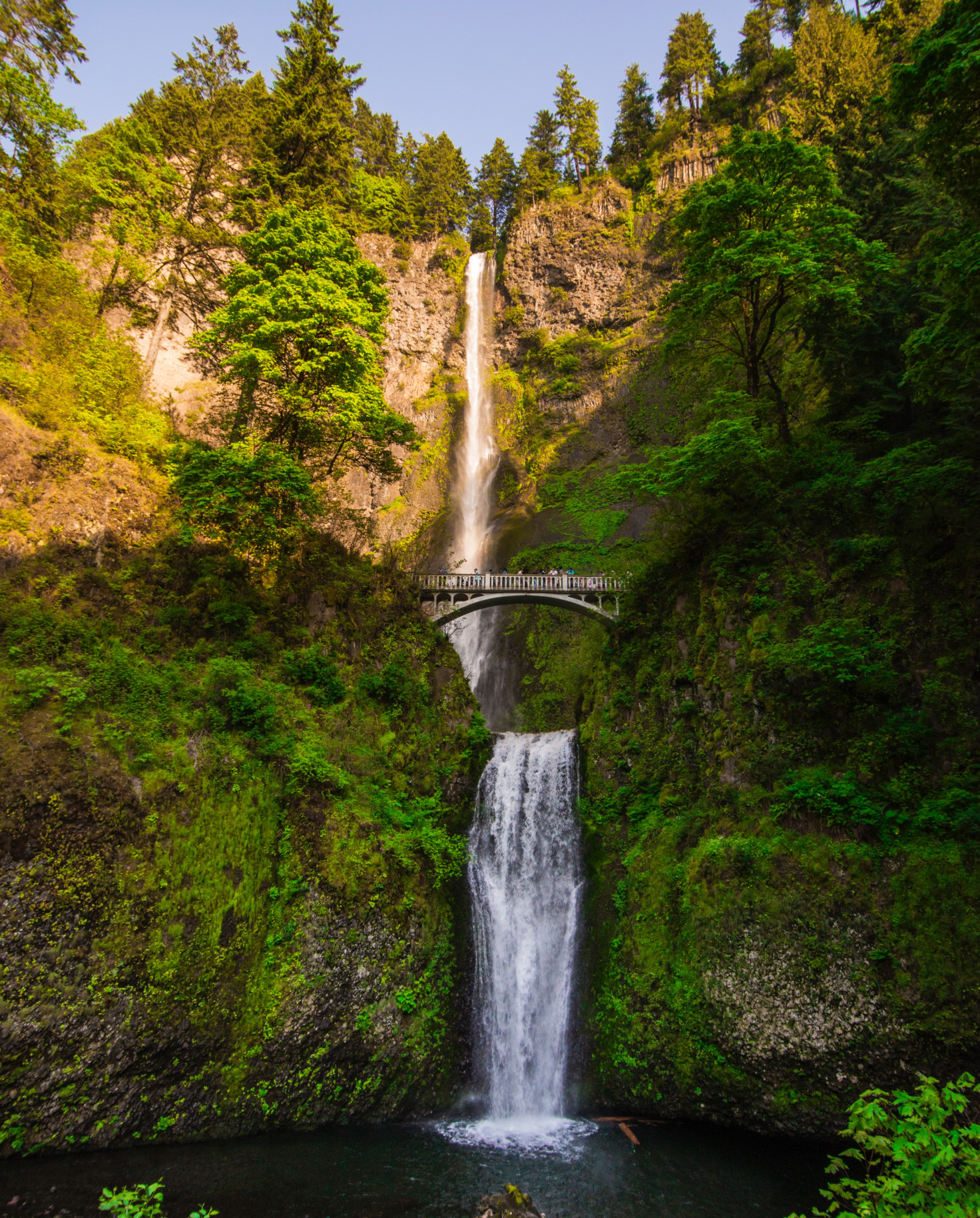 green landscape with waterfall and bridge columbia river gorge oregon