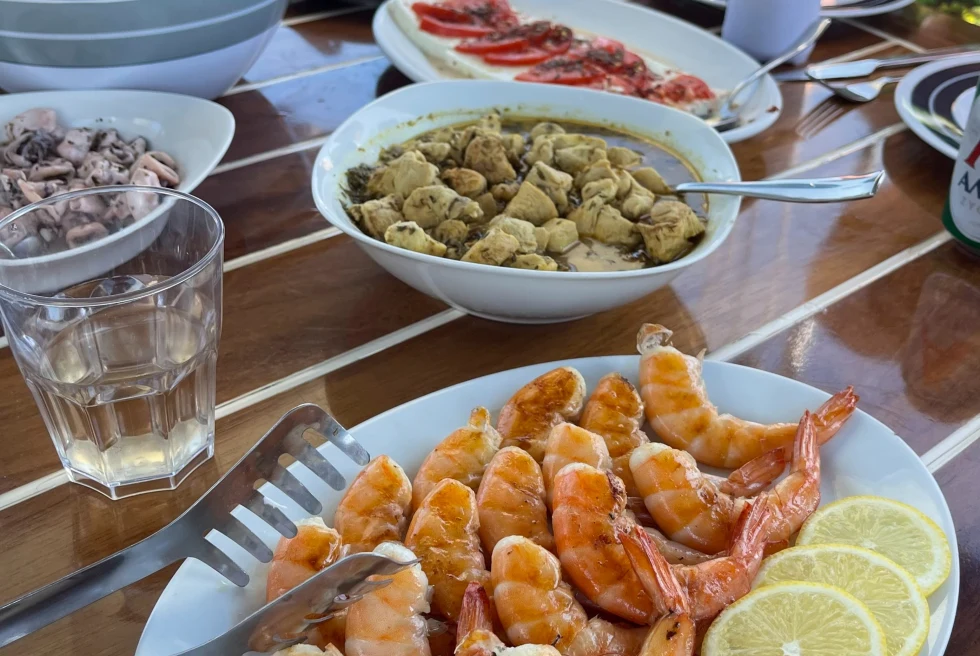 shrimp and lemon slices served on a plate