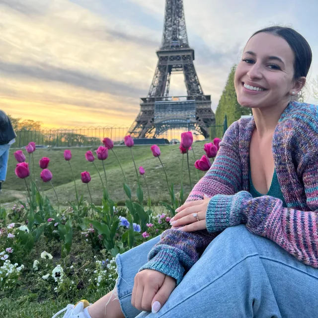 Picture of Mia with flowers at Eiffle tower