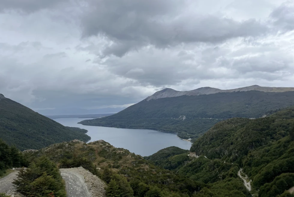 view from submit mountain region and lake on a cloudy day