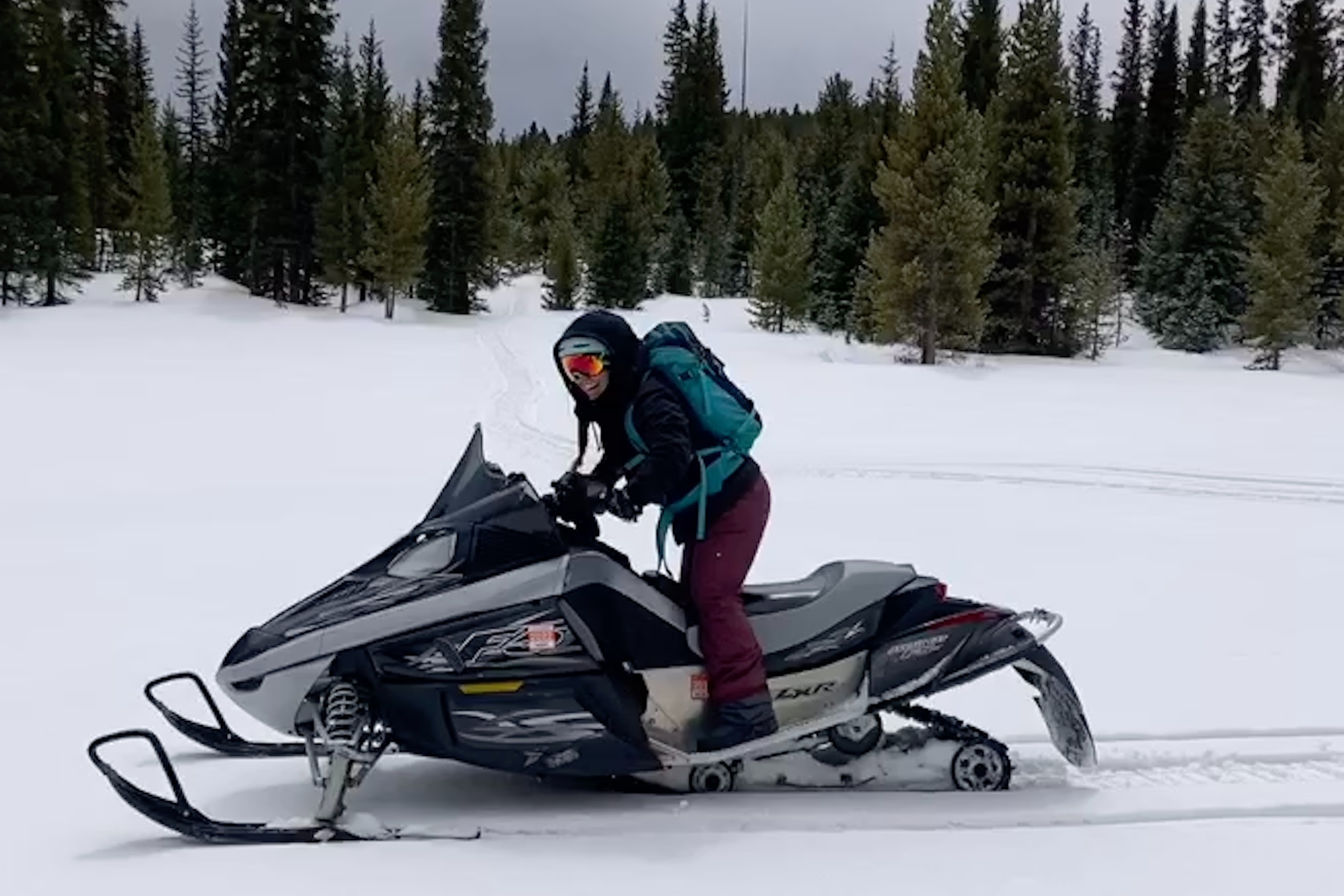 Book a snowmobiling tour to see the stunning views of the mountains.