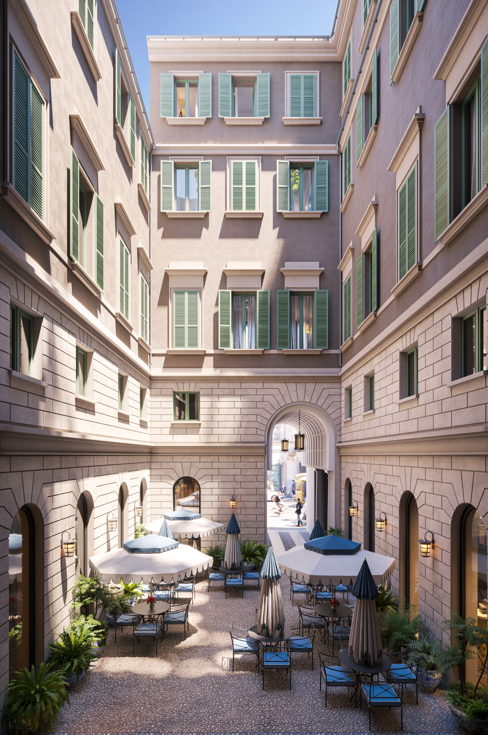 a hidden Milanese courtyard with charming tables and blue chairs