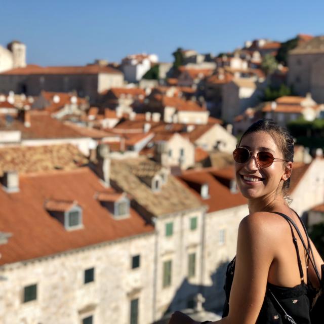 Girl wearing sunglasses smiling