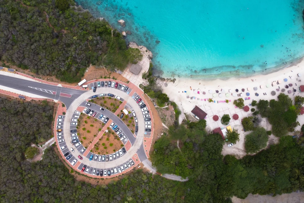 Aerial view of blue waters and white sand at Kenepa Beach in Curacao