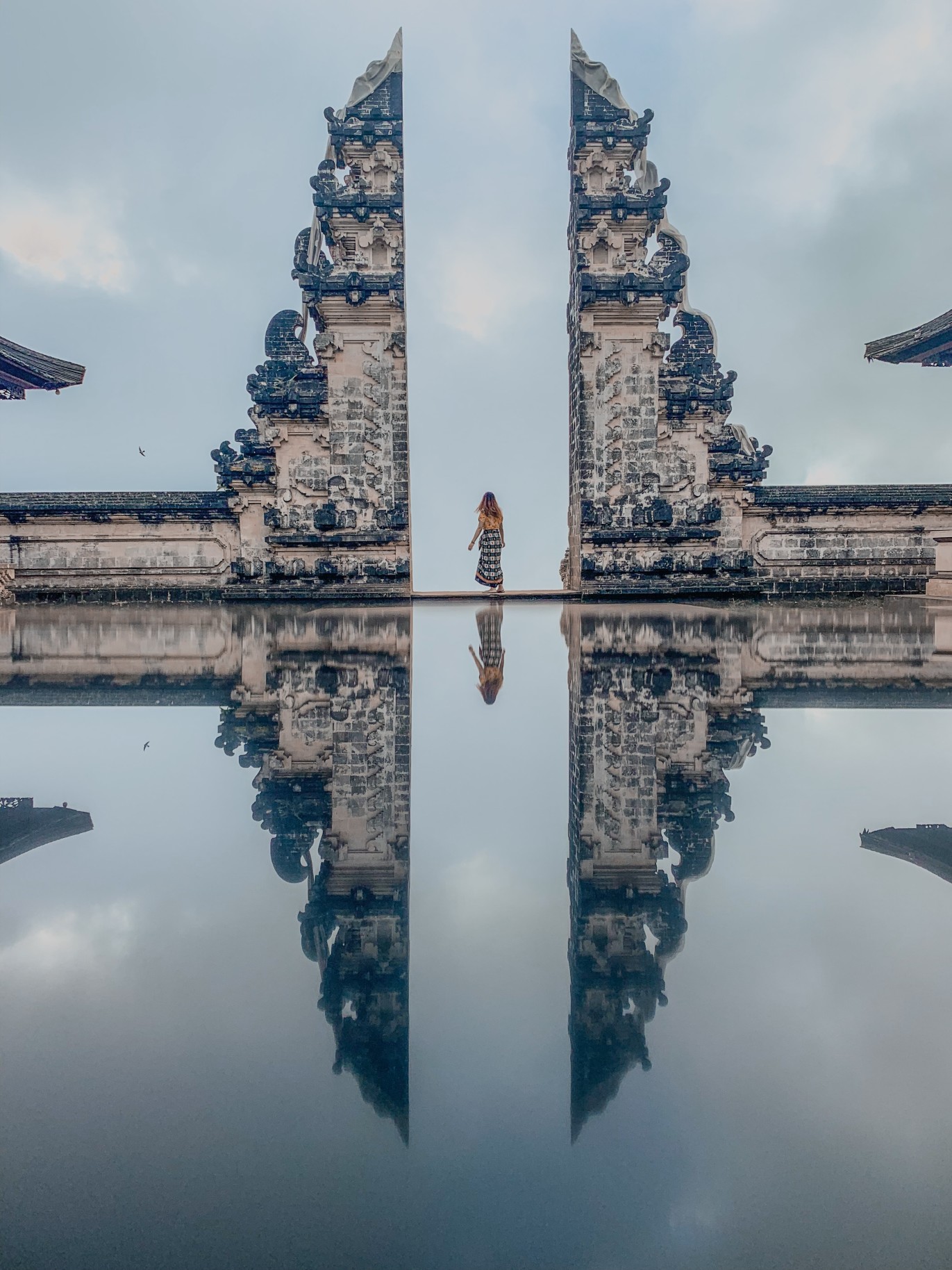 Temple and person in Bali. 