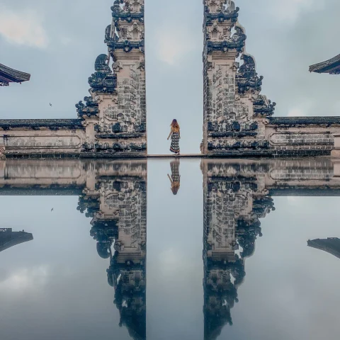 Temple and person in Bali. 