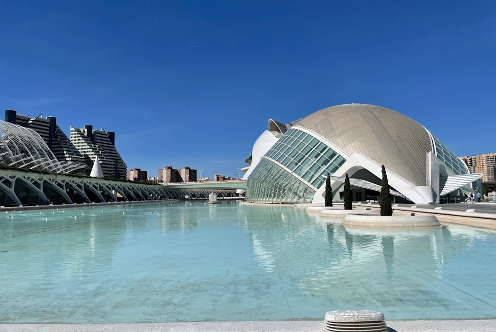The City of Arts glass building and pool in Valencia.