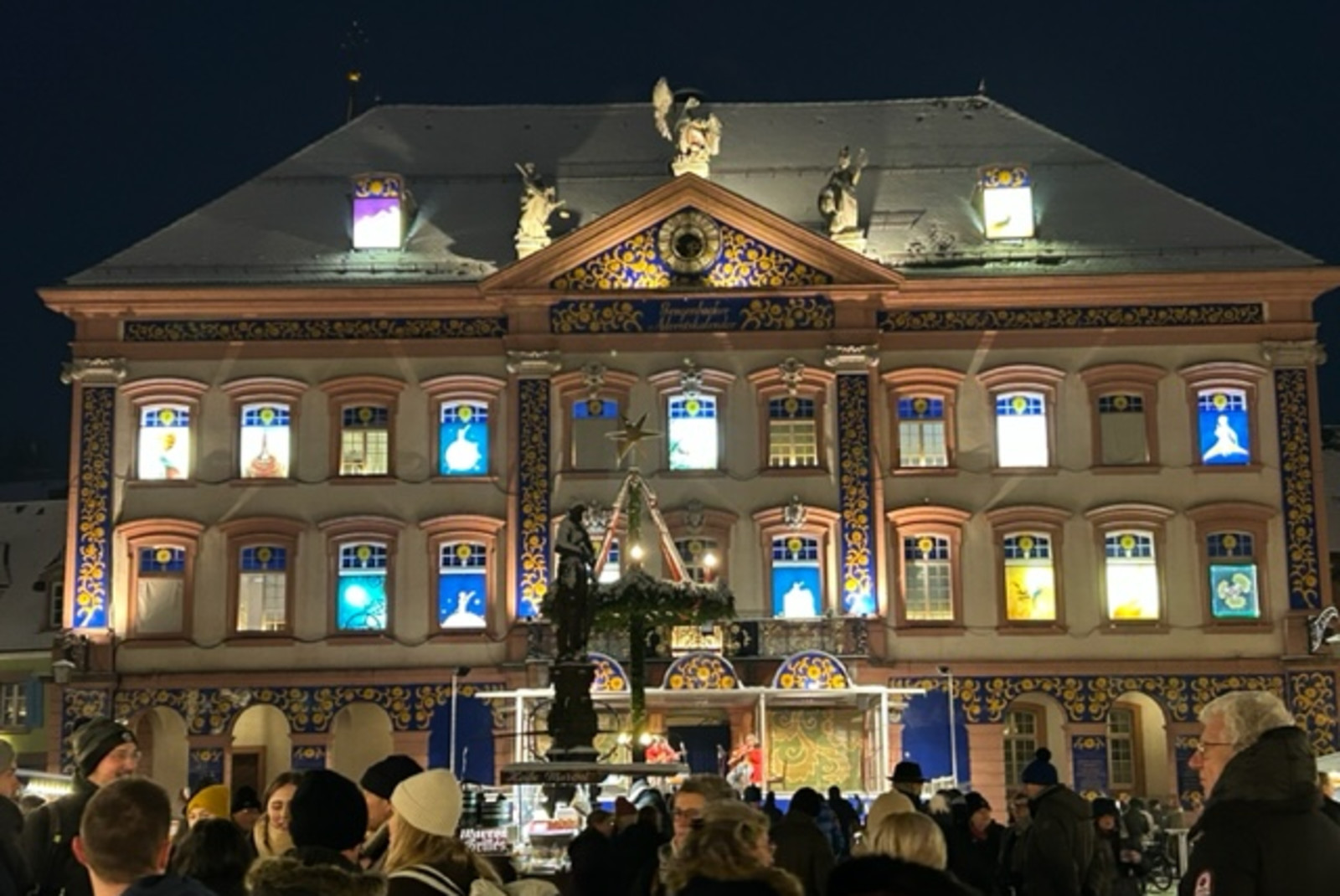 large building with bright lights during nighttime