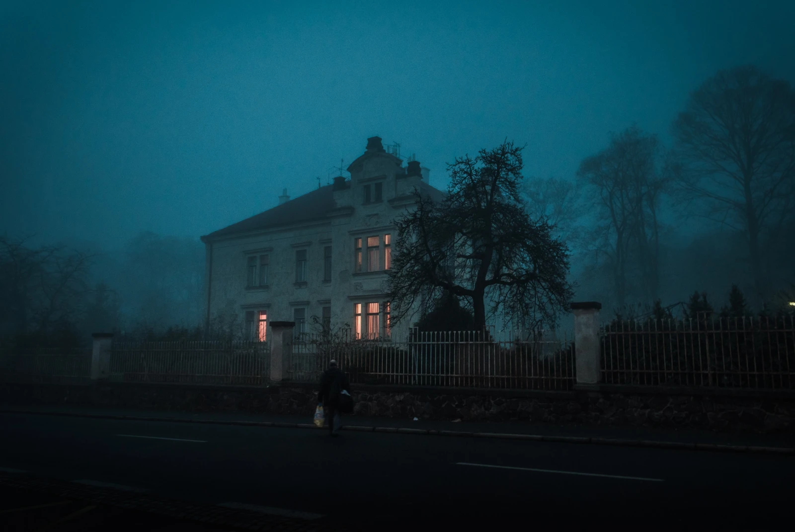 A haunted house at night. 