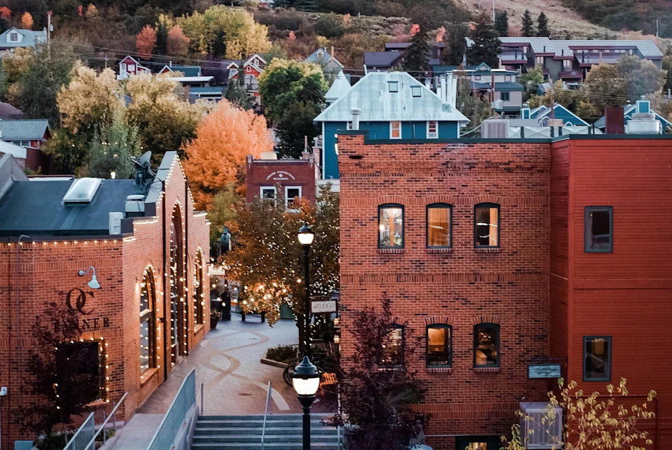 buildings next to mountain during daytime
