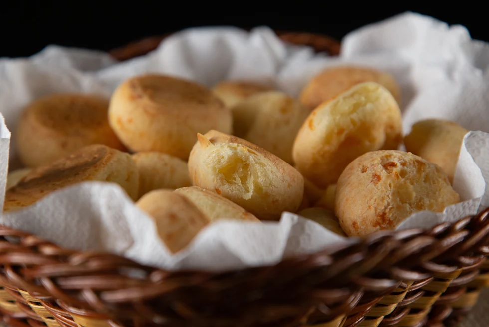 Pão de Queijo (cheese bread) in a basket in Brazil