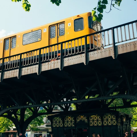 A yellow trail on a rail line in Berlin.