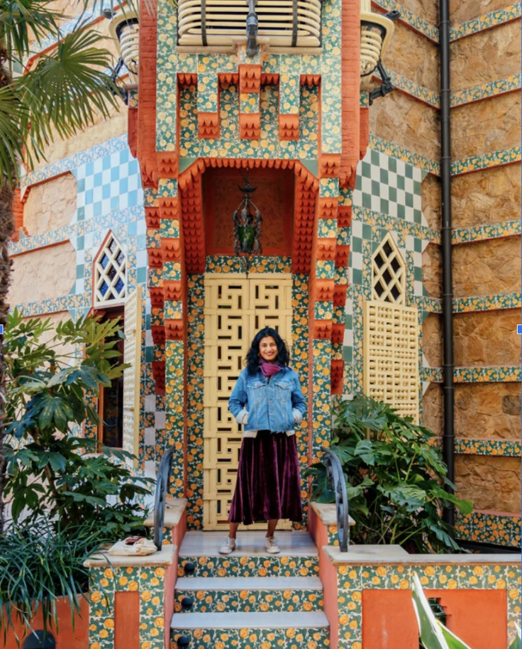 Gaya Vinay standing on colorful steps