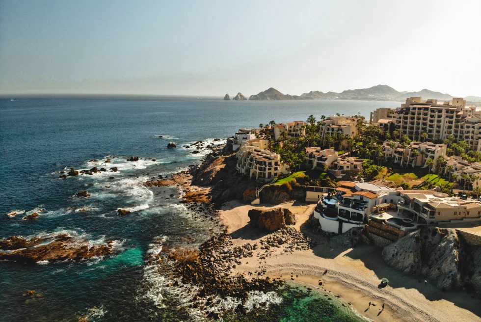 aerial view of buildings and coastline during daytime