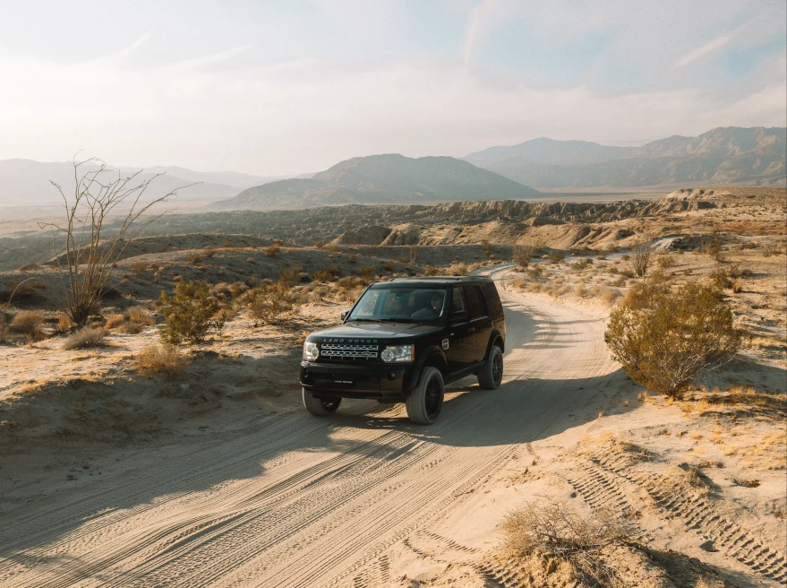 black jeep on desert road