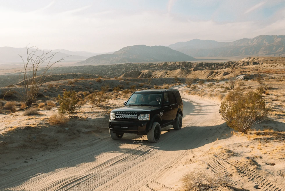 black jeep on desert road