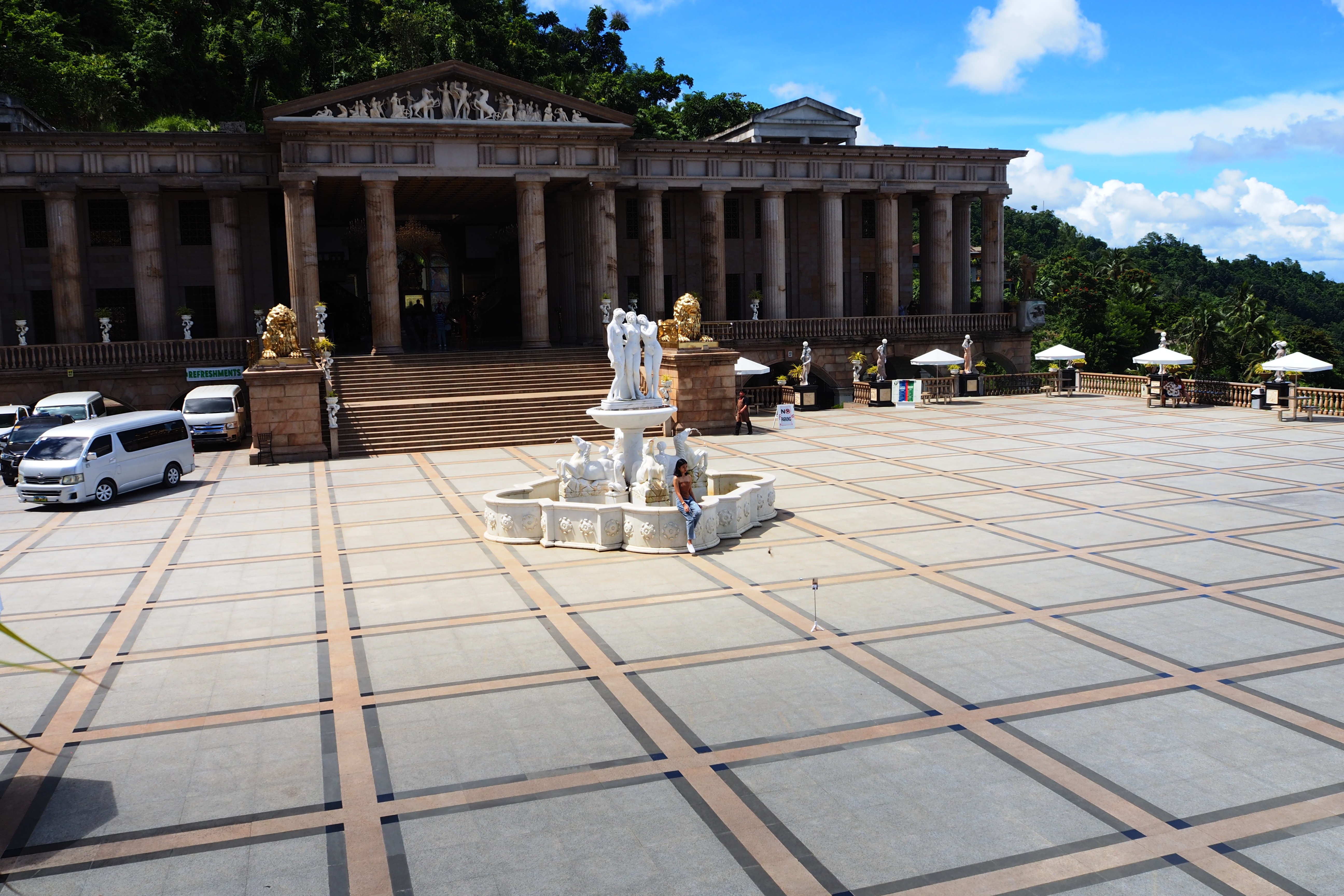 An aerial view of the ground with a statue.