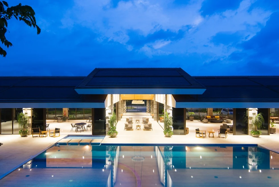 aerial view of an illuminated pool at night