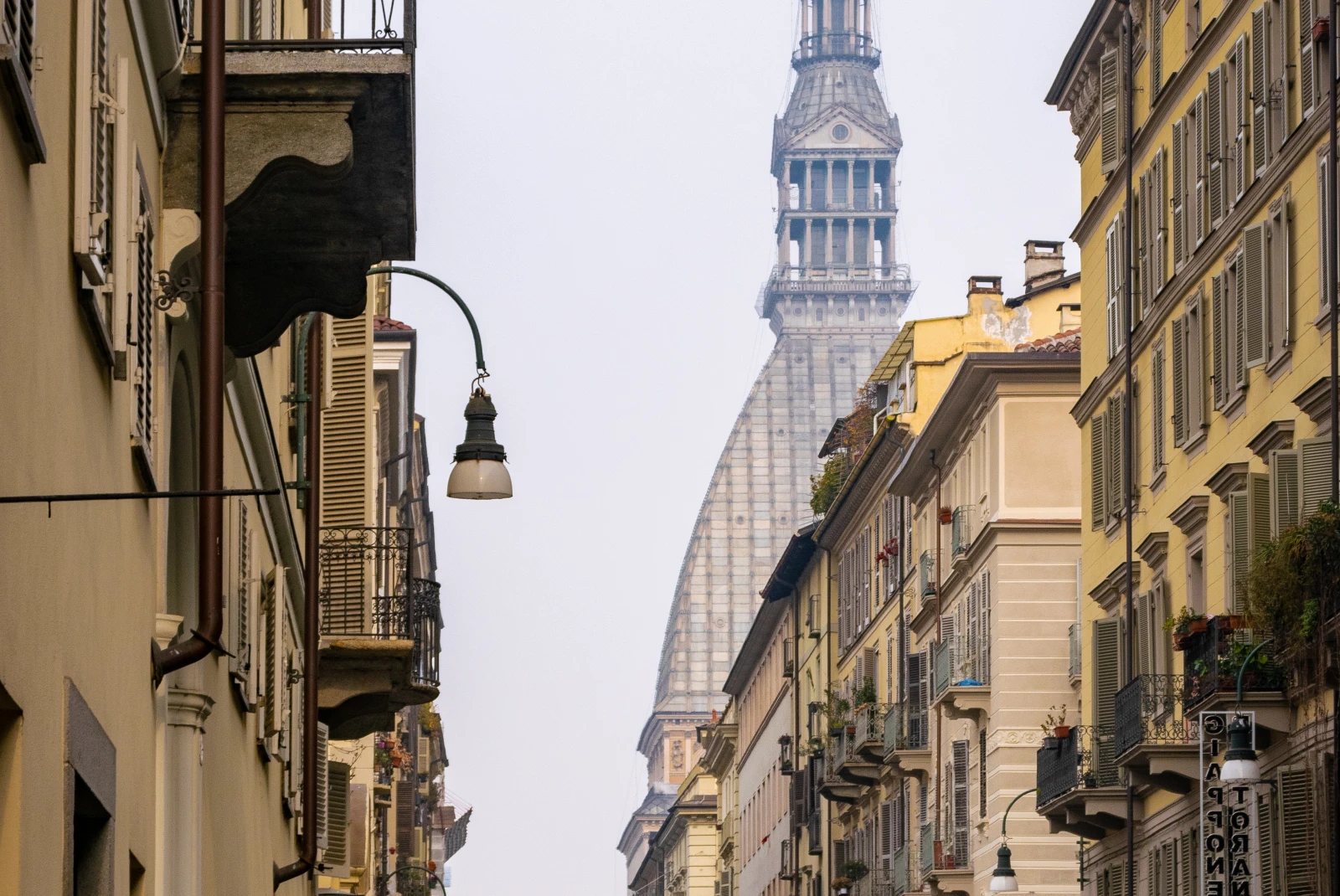The streets of Torino, Italy with Mole antonelliana in the background