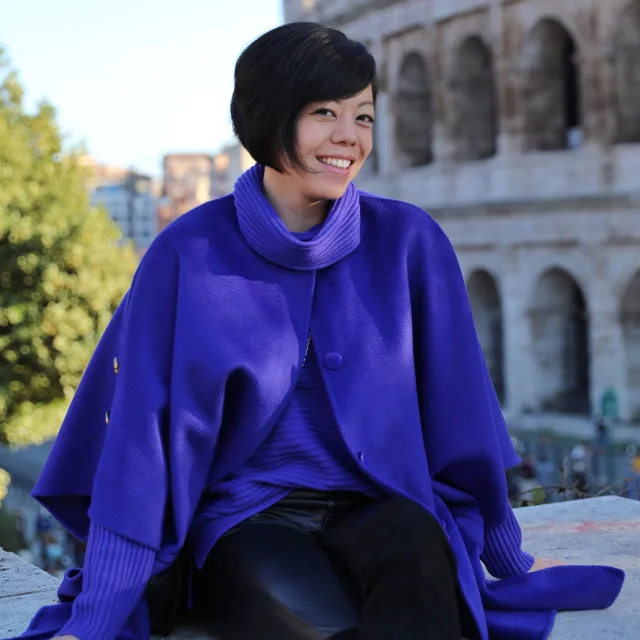 May Liu in a blue coat