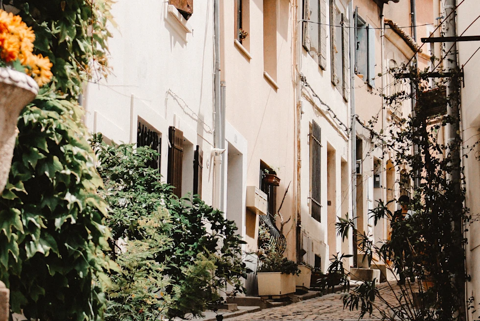 stone stairs lined with buildings during daytime