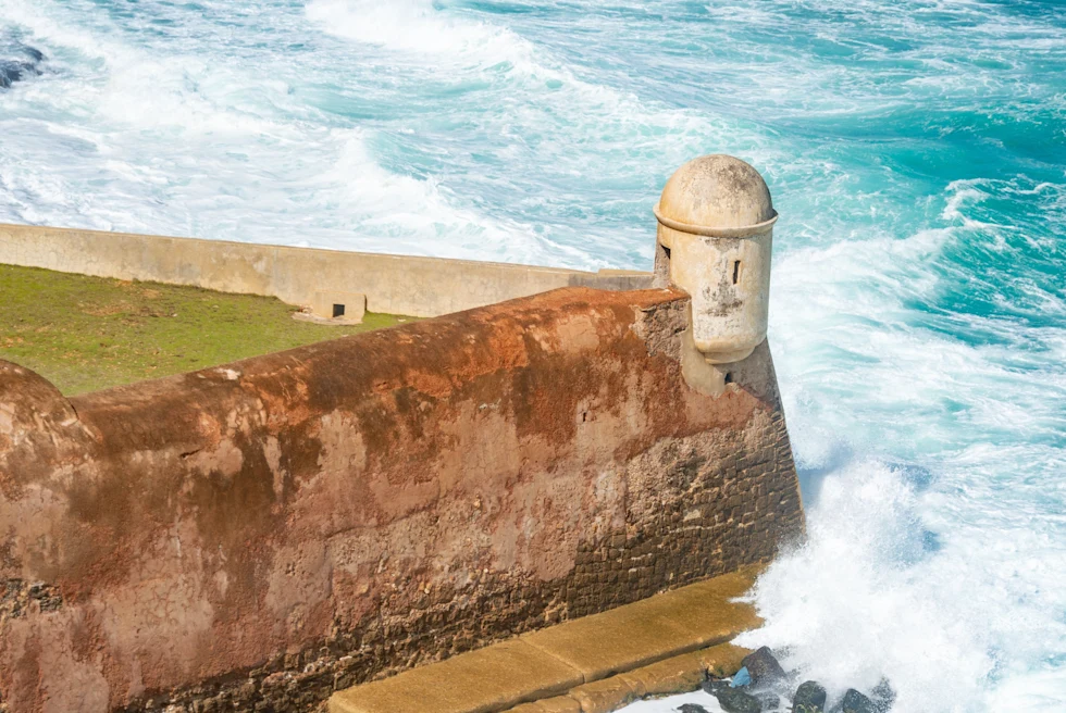 The walled city of Cartagena against the ocean.