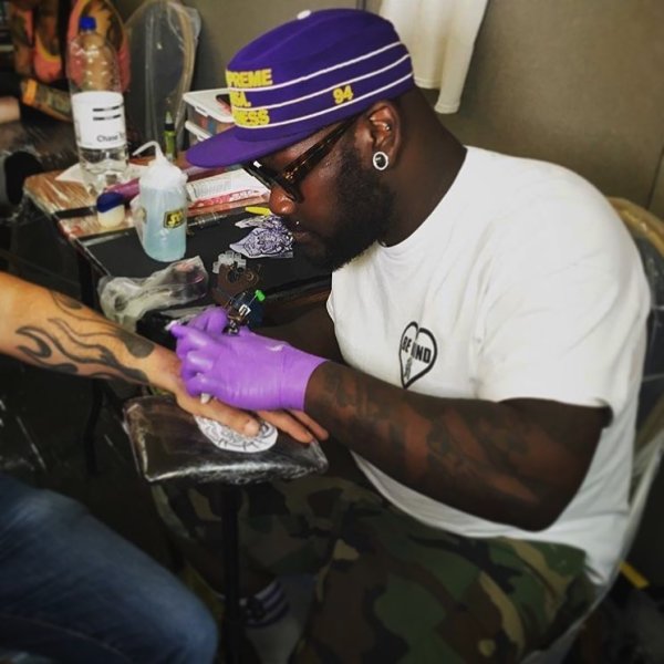 Lord Montana tattooing
