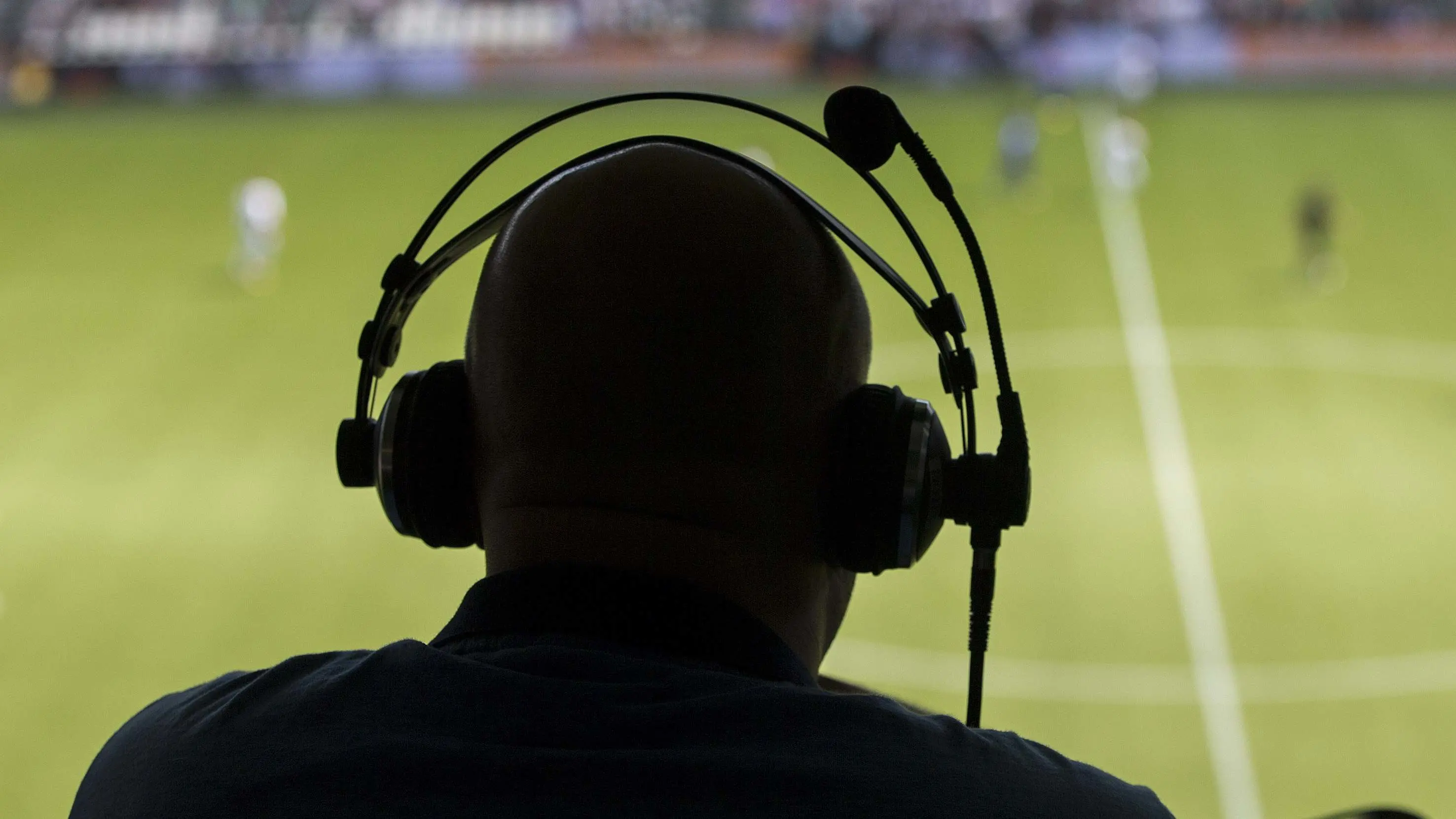 commentator-silhouette