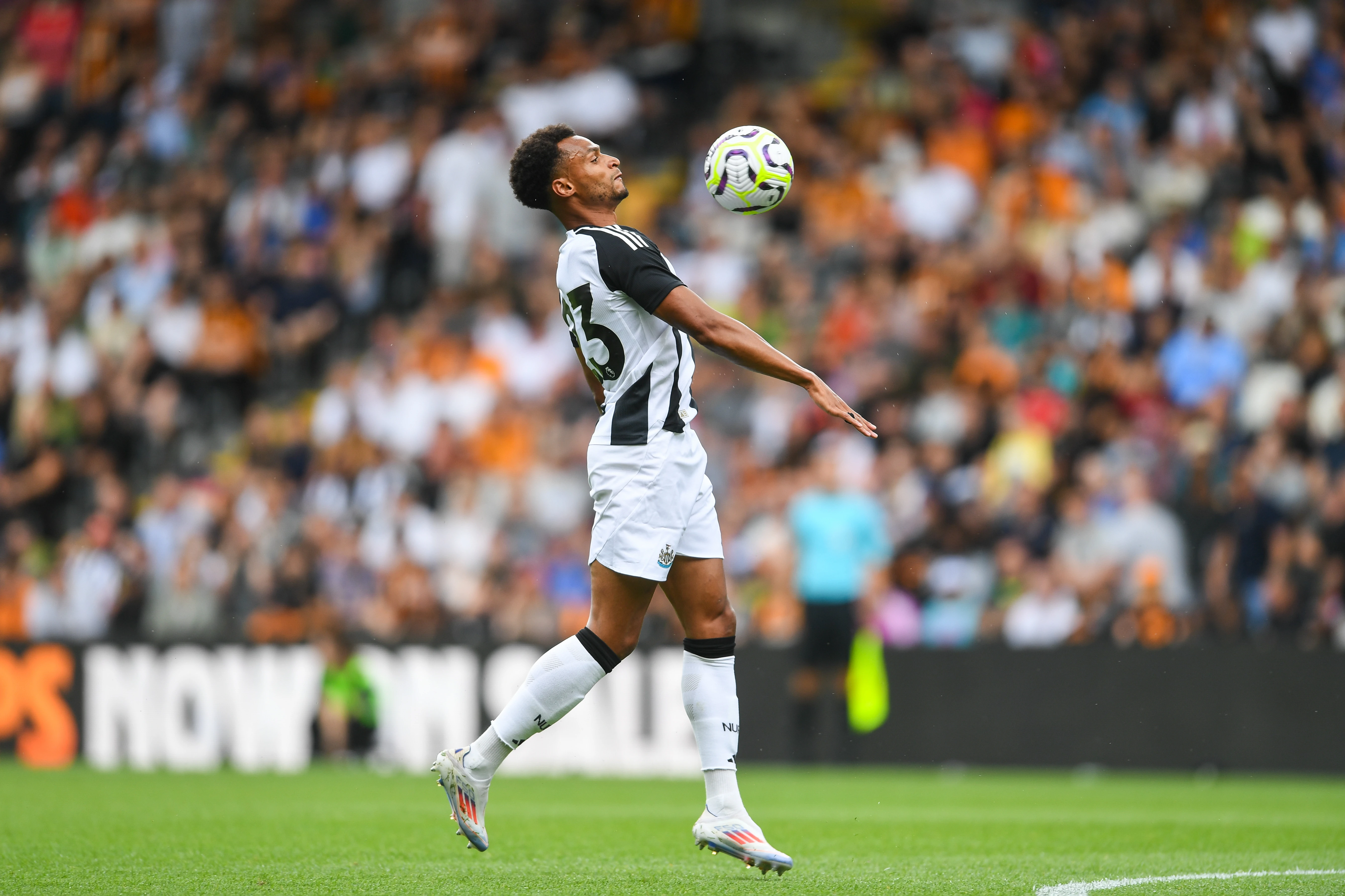 Jacob Murphy chests the ball