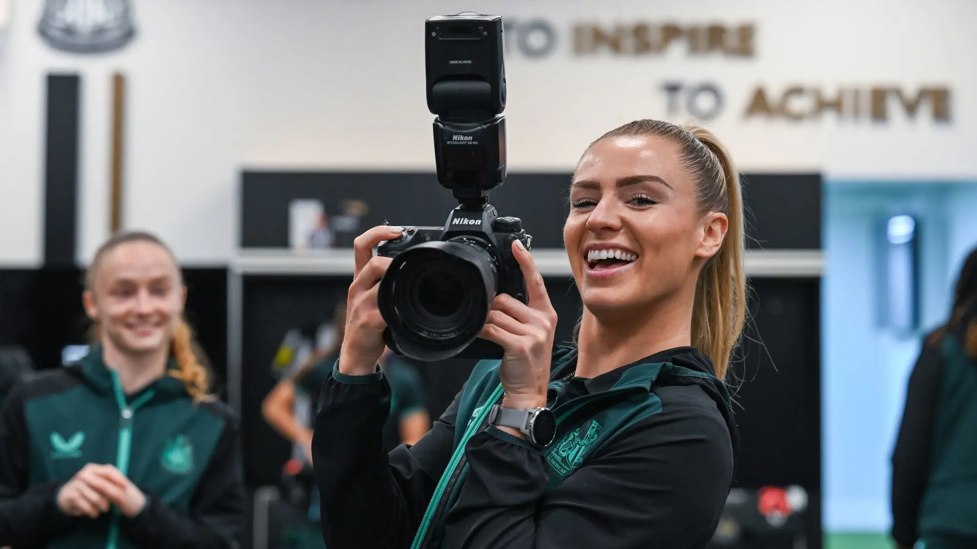 Newcastle United Women's Team player, Emma Kelly, with camera