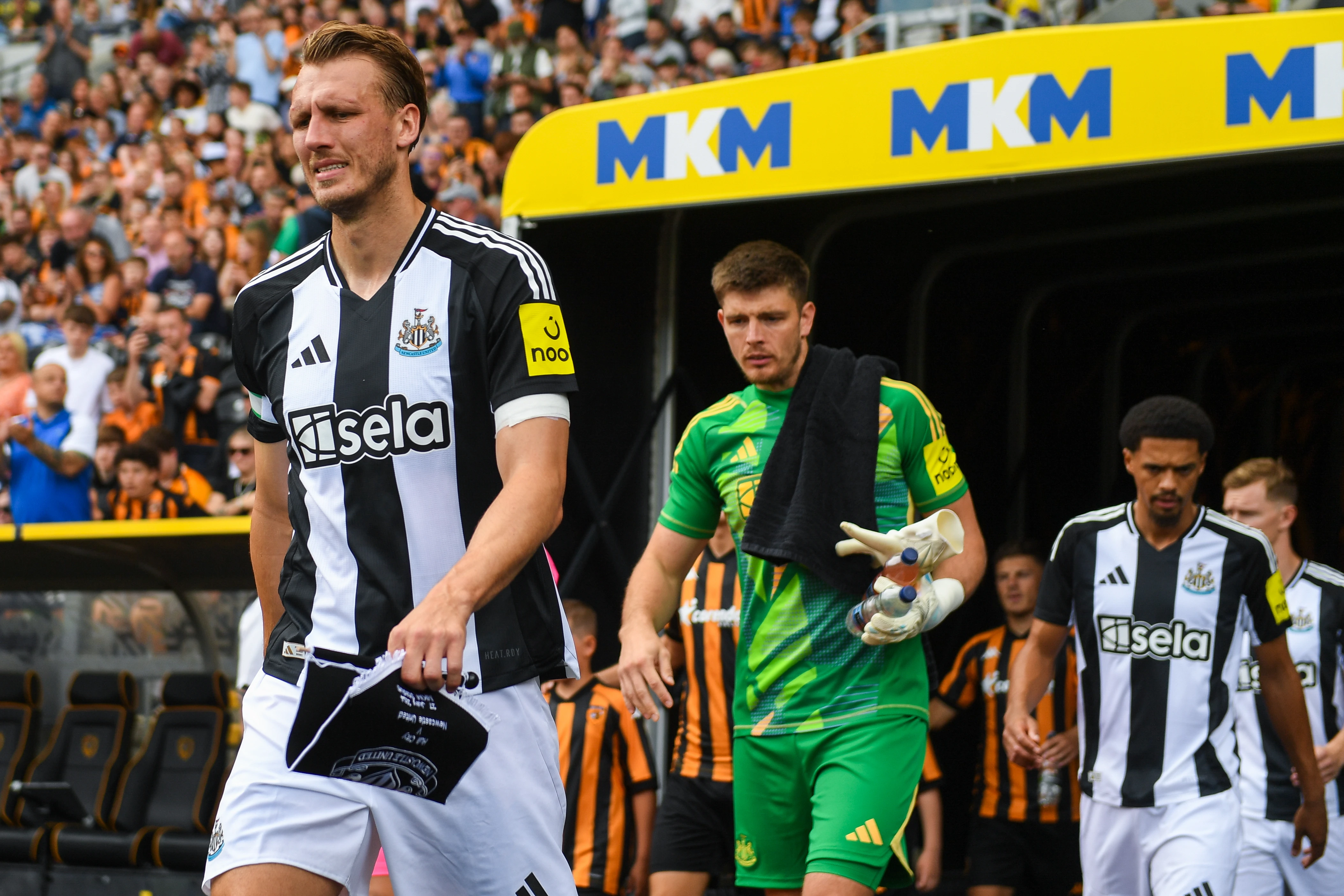 Dan Burn leads team out