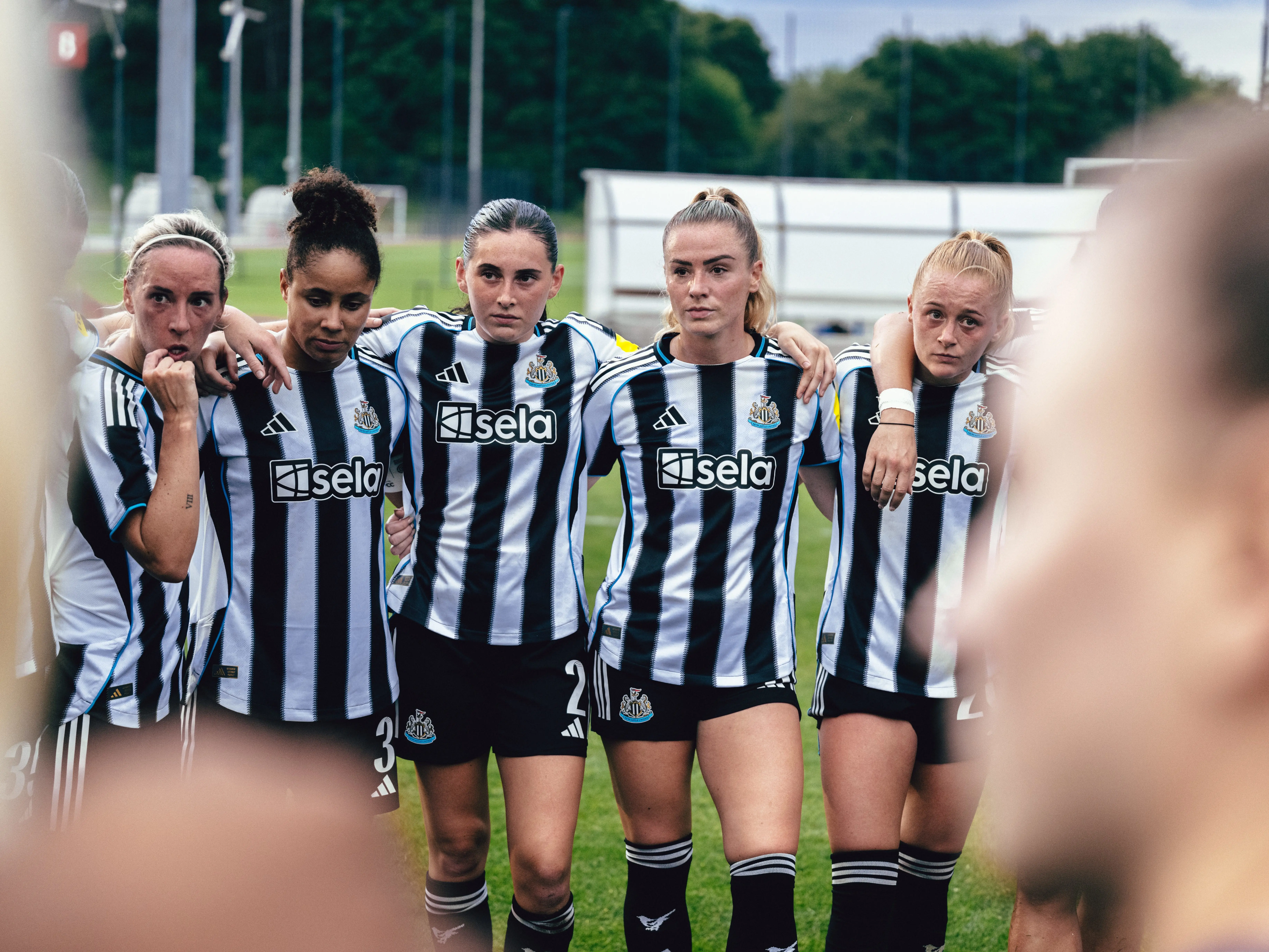 NUW team huddle