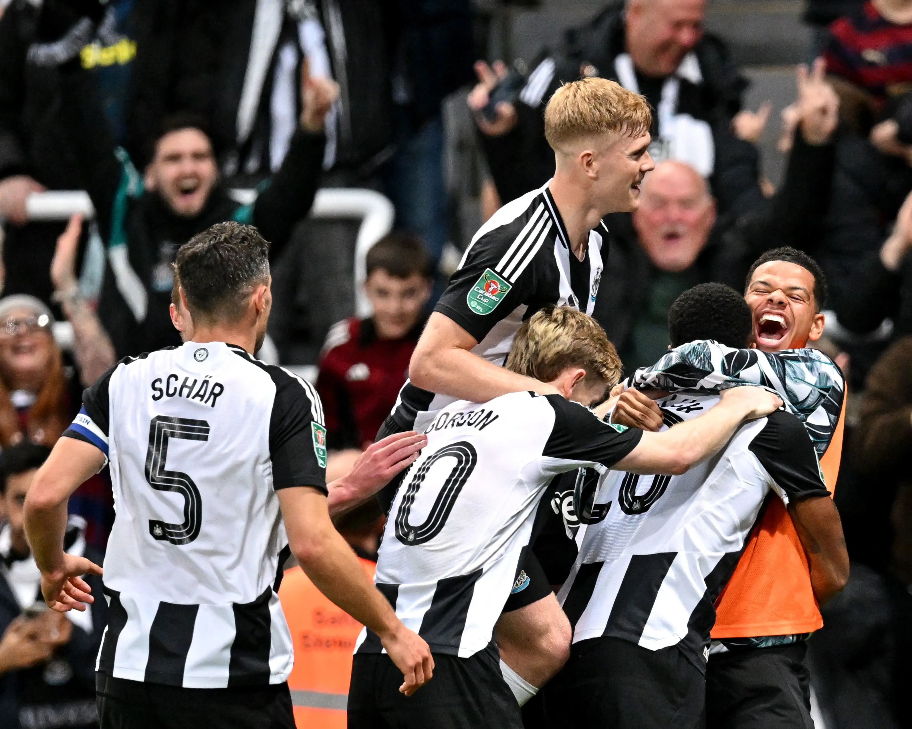 The Magpies celebrate