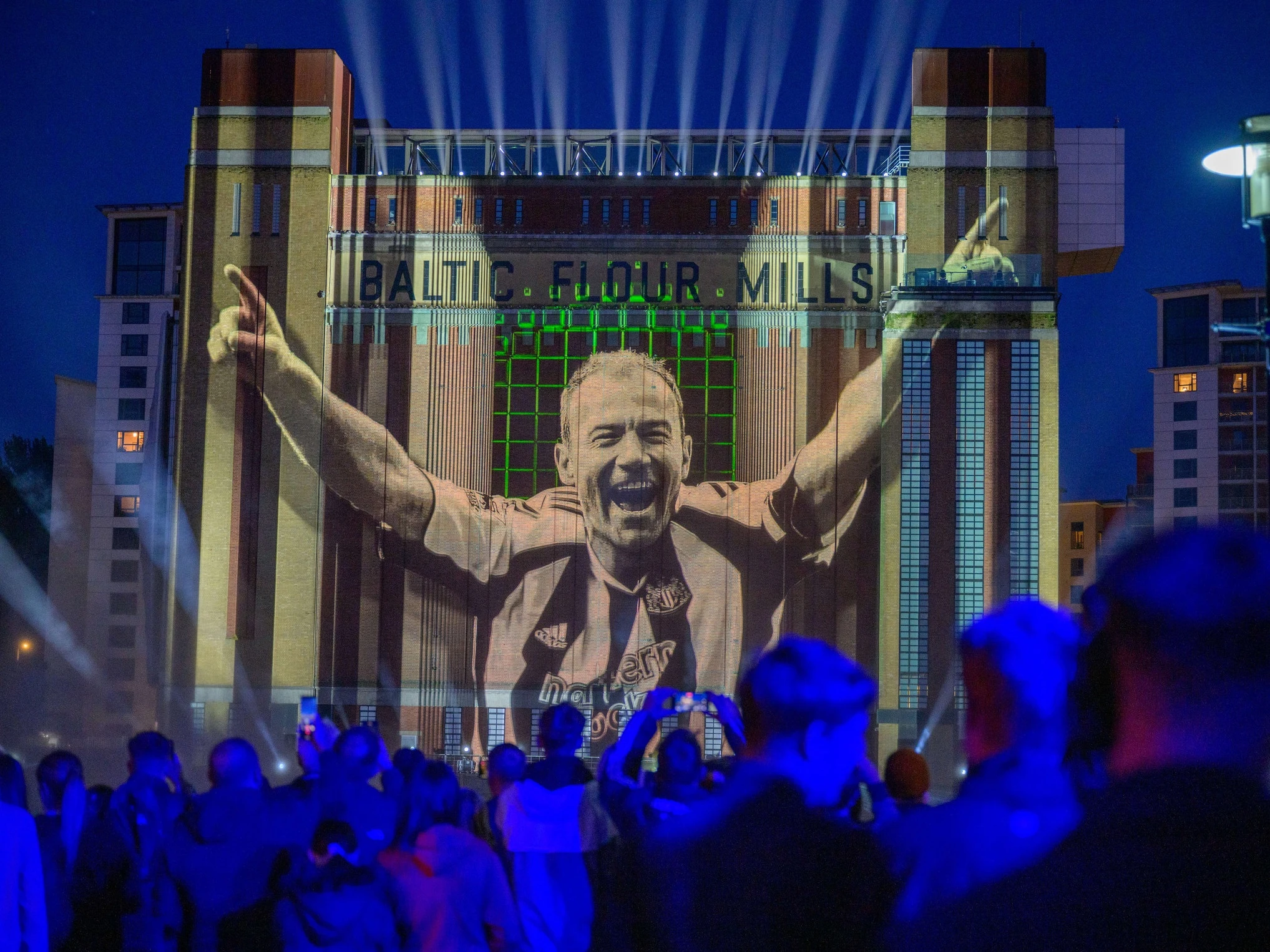 An image of Alan Shearer is projected onto the Baltic Flour Mill