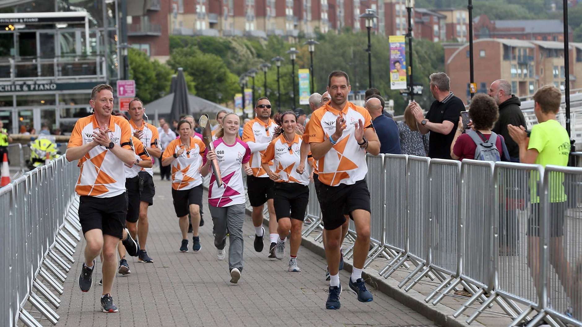 Katie Barker carries Commonwealth baton through Newcastle Newcastle