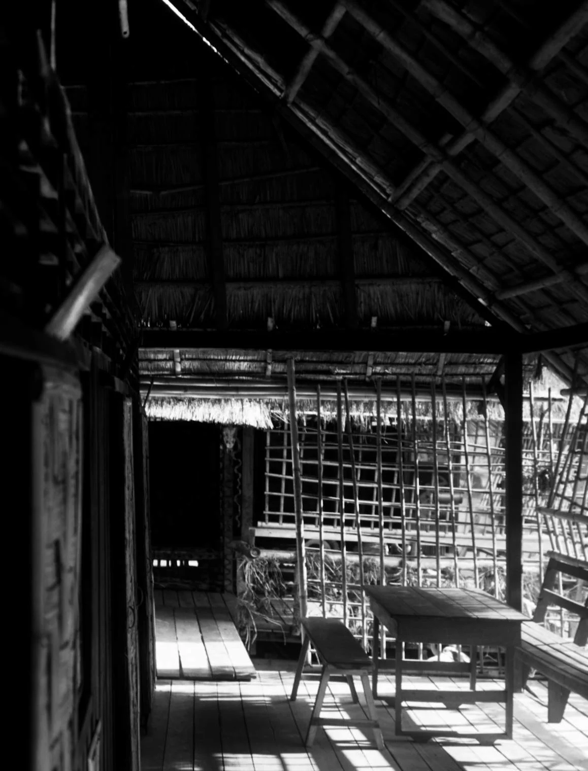 teak and bamboo interior, raft house, river kwai