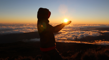 Zonsopkomst vanop de hoogste top: Piton des Neiges.