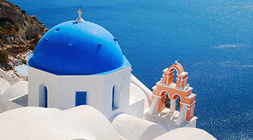 Wandel langs de kliffen in Santorini en aanschouw het mooiste kleurenspektakel van Griekenland.