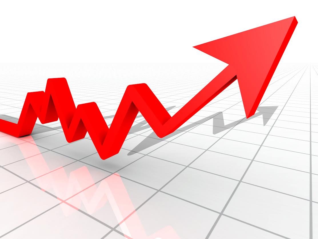 Business Graph with arrow showing profits and gains on a white reflective background