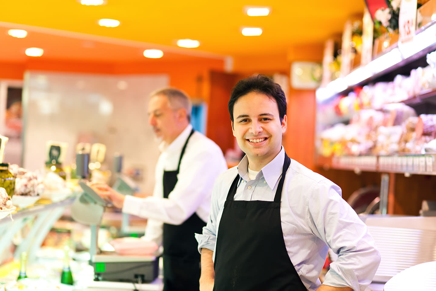 Smiling restaurant workers.