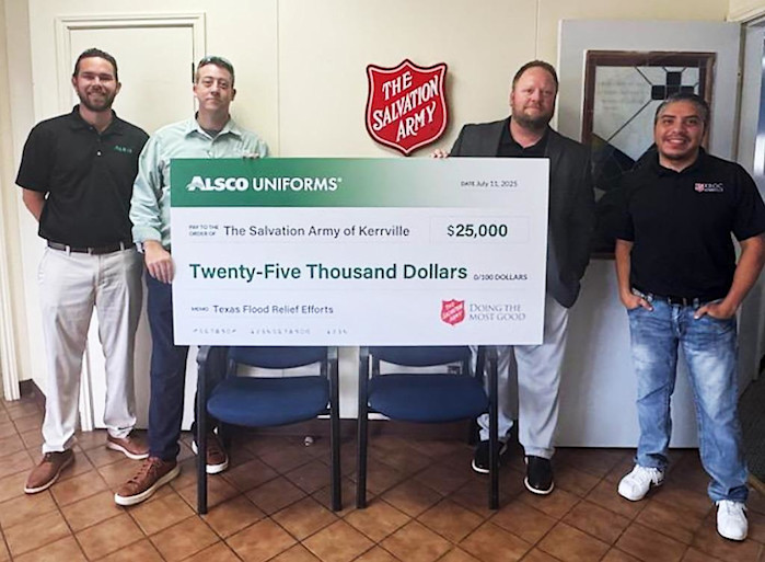 A picture of Alsco Uniforms employees donating a giant check or $25,000 to the Salvation Army.