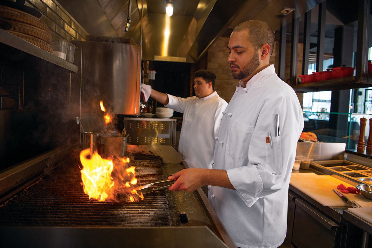 Chef working with fire.