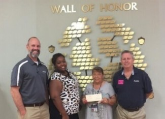 Alsco donates to Holiday House of Portsmouth