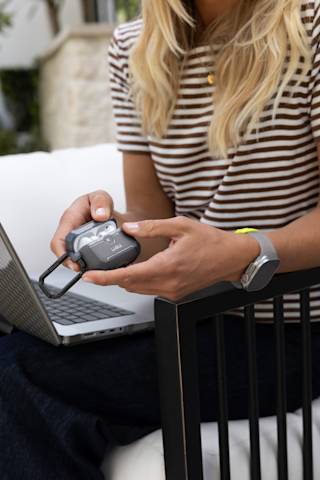 UAG Scout Case for AirPods Pro (3rd Gen, 2025) AirPods Pro (3rd Gen) in Coyote Translucent lifestyle view